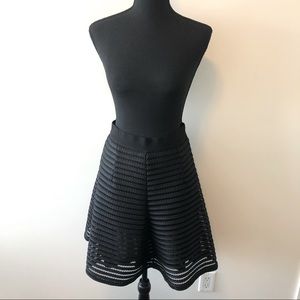 Black A-line skirt with lace details